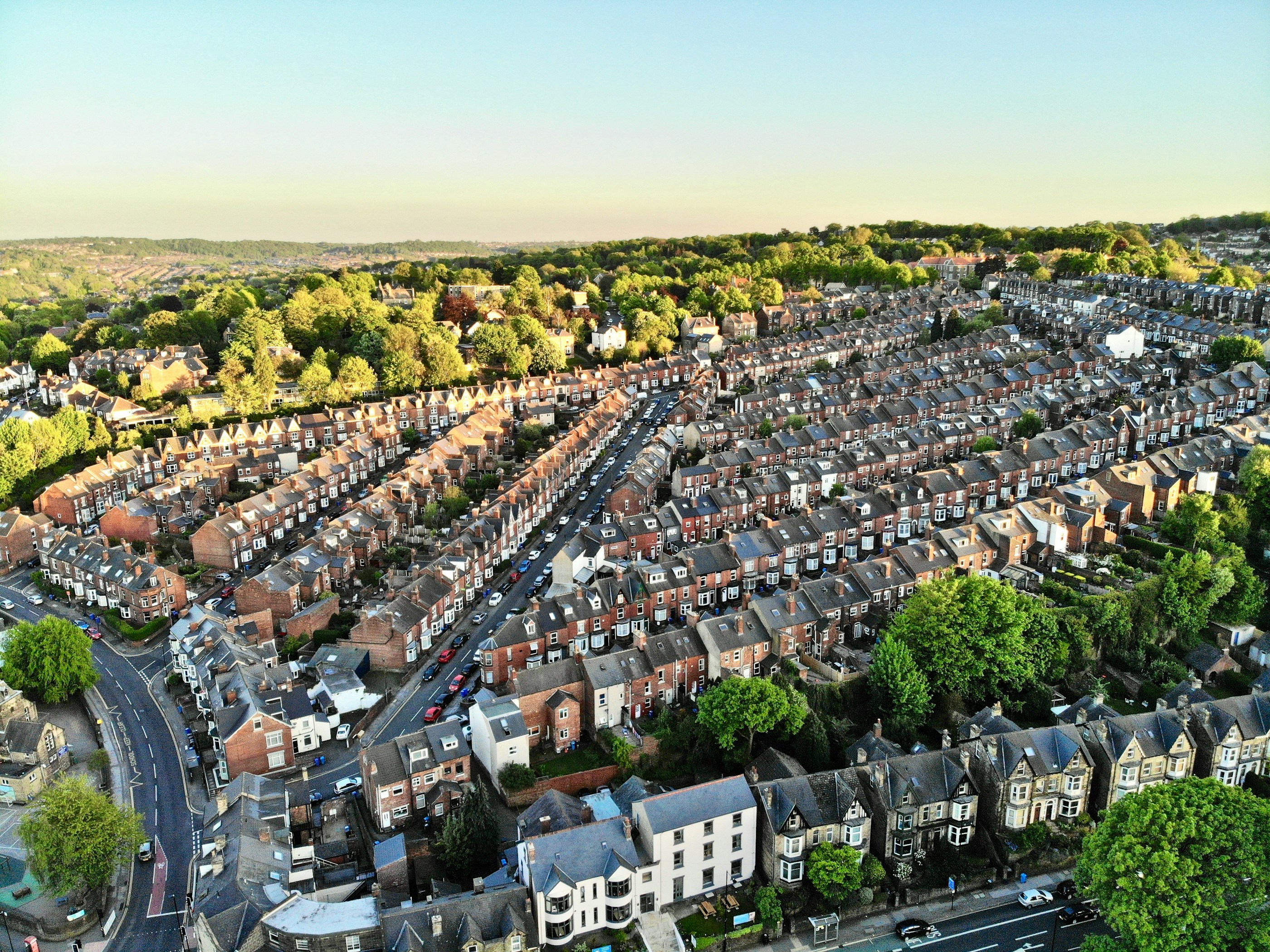 Aerial photograph of residential terraces and tree-lined neighbourhoods in Sheffield, England